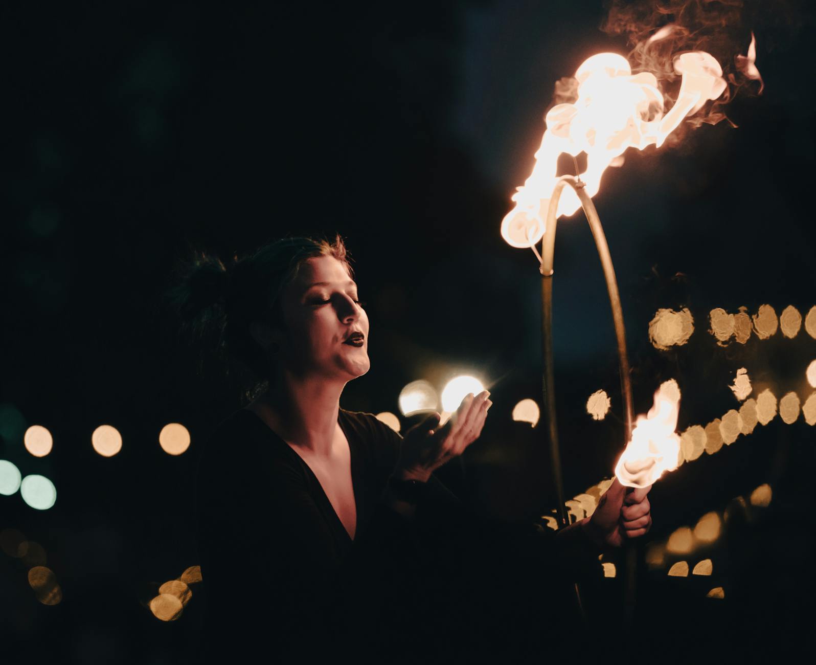 woman setting fire to rim